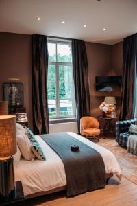 Postel nebo postele na pokoji v ubytování B&B Maison Mairie Hasselt