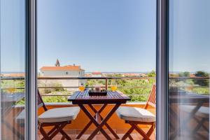 Balkón alebo terasa v ubytovaní Apartments Bonex