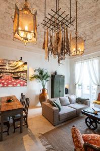 a living room with a couch and a table at Torretta Martina in Martina Franca +87 photos