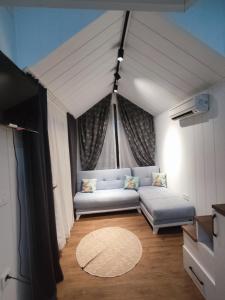 Postel nebo postele na pokoji v ubytování Dikili ZeyTiny House