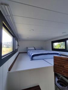 Postel nebo postele na pokoji v ubytování Dikili ZeyTiny House