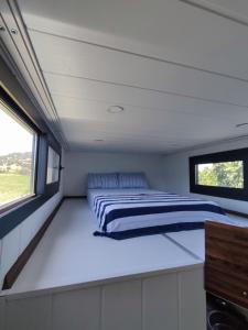 Postel nebo postele na pokoji v ubytování Dikili ZeyTiny House