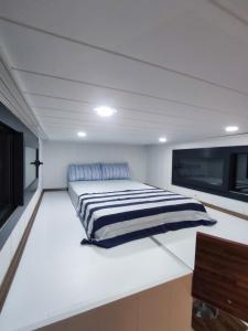 Postel nebo postele na pokoji v ubytování Dikili ZeyTiny House