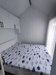 Postel nebo postele na pokoji v ubytování Dikili ZeyTiny House