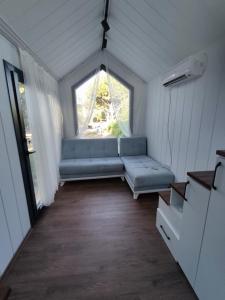 Postel nebo postele na pokoji v ubytování Dikili ZeyTiny House