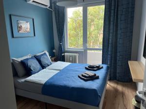 Ένα ή περισσότερα κρεβάτια σε δωμάτιο στο Brand NEW! 2BDR Lux Apartment RAYKO