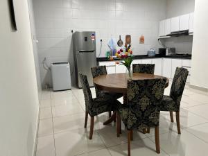 Kuchyň nebo kuchyňský kout v ubytování Da Men Studio Service Apartment