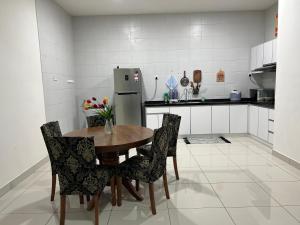Kuchyň nebo kuchyňský kout v ubytování Da Men Studio Service Apartment