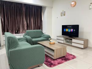 TV a/nebo společenská místnost v ubytování Da Men Studio Service Apartment