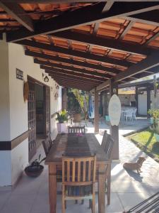 Un patio sau altă zonă în aer liber la Seu lar na praia