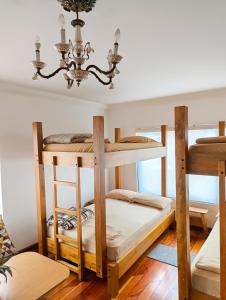 Postel nebo postele na pokoji v ubytování Hostal Mochiliers Bed and Breakfast
