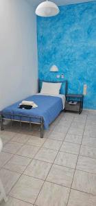 Ліжко або ліжка в номері Hotel Palladion
