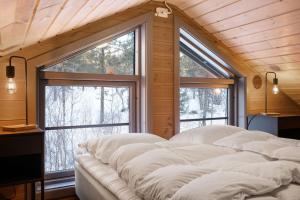 Ένα ή περισσότερα κρεβάτια σε δωμάτιο στο The cabin at Lemonsjøen Jotunheimen