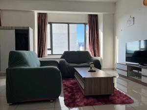 TV a/nebo společenská místnost v ubytování Da Men Studio Service Apartment