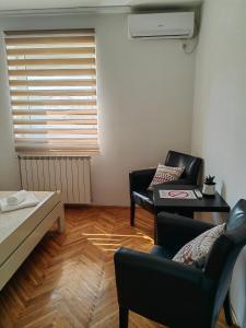 Posezení v ubytování Orient Apartman