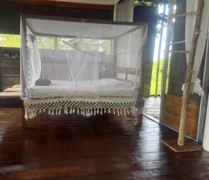 Ένα ή περισσότερα κρεβάτια σε δωμάτιο στο El Mirador y el Nido