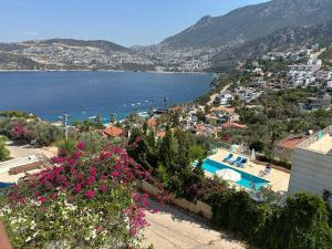 a view of a city and a body of water at Villa ZEYNO in Kaş