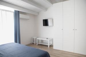 A bed or beds in a room at CASA MAIOLICA