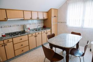 Η κουζίνα ή μικρή κουζίνα στο Appartamento Cardalda