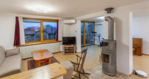 TV a/nebo společenská místnost v ubytování Lakeview Apartments Bled