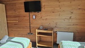 Postel nebo postele na pokoji v ubytování Alpes Hotel
