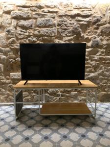 TV a/nebo společenská místnost v ubytování Marì Affittacamere