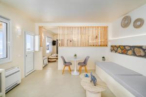 Voodi või voodid majutusasutuse Eolithos Exclusive Suites toas
