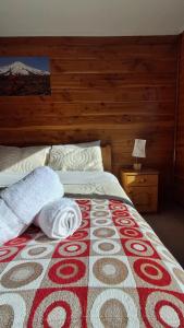 Postel nebo postele na pokoji v ubytování Alpes Hotel