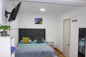 Cama ou camas em um quarto em Hostal Familiar S&G