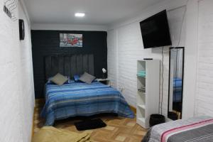 Cama ou camas em um quarto em Hostal Familiar S&G