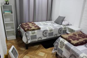 Cama ou camas em um quarto em Hostal Familiar S&G