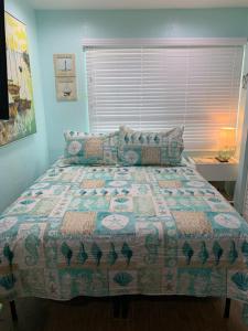 En eller flere senge i et værelse på Coquina Beach Club 109 + 38 billeder