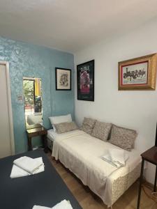 Postel nebo postele na pokoji v ubytování ASTAKOS apartments Budva
