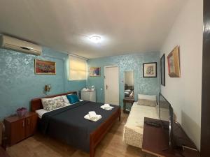 Postel nebo postele na pokoji v ubytování ASTAKOS apartments Budva