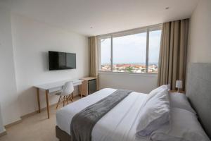 Postel nebo postele na pokoji v ubytování Hotel Stil Cartagena