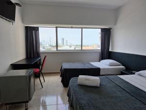 Postel nebo postele na pokoji v ubytování Hotel Stil Cartagena