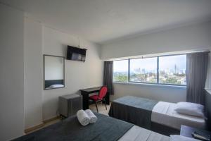 Postel nebo postele na pokoji v ubytování Hotel Stil Cartagena