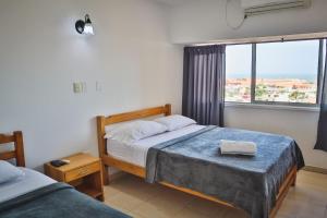 Postel nebo postele na pokoji v ubytování Hotel Stil Cartagena
