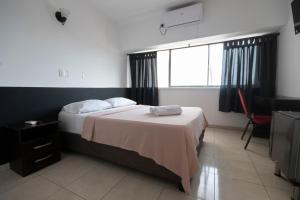 Postel nebo postele na pokoji v ubytování Hotel Stil Cartagena