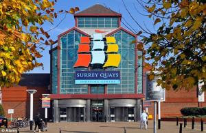 a building with a sign for a sunbury outlet at Surrey Quays Studio in London