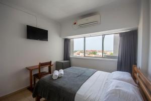 Postel nebo postele na pokoji v ubytování Hotel Stil Cartagena