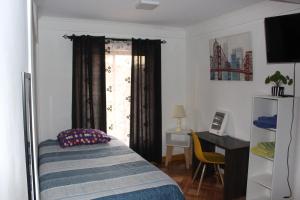 Cama ou camas em um quarto em Hostal Familiar S&G