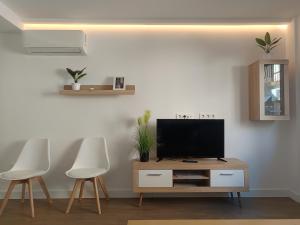 Et tv og/eller underholdning på Alojamiento Los Alamos