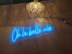 a sign that says oh bebelle use on a wall at Blue dream Hamaca in Grand-Bourg
