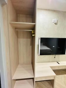 TV a/nebo společenská místnost v ubytování Tai Dong Jin Kuai Homestay