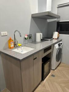 Kuchyň nebo kuchyňský kout v ubytování Tai Dong Jin Kuai Homestay