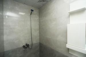 Koupelna v ubytování VƏTƏN Hotel + 37 fotografií