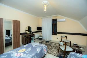 Postel nebo postele na pokoji v ubytování VƏTƏN Hotel
