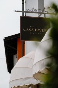a sign for a casa pampas hotel at Hotel Casa Pavesi in Grinzane Cavour