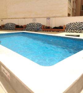 The swimming pool at or close to Apartment with pool near beach, Playa del Cura